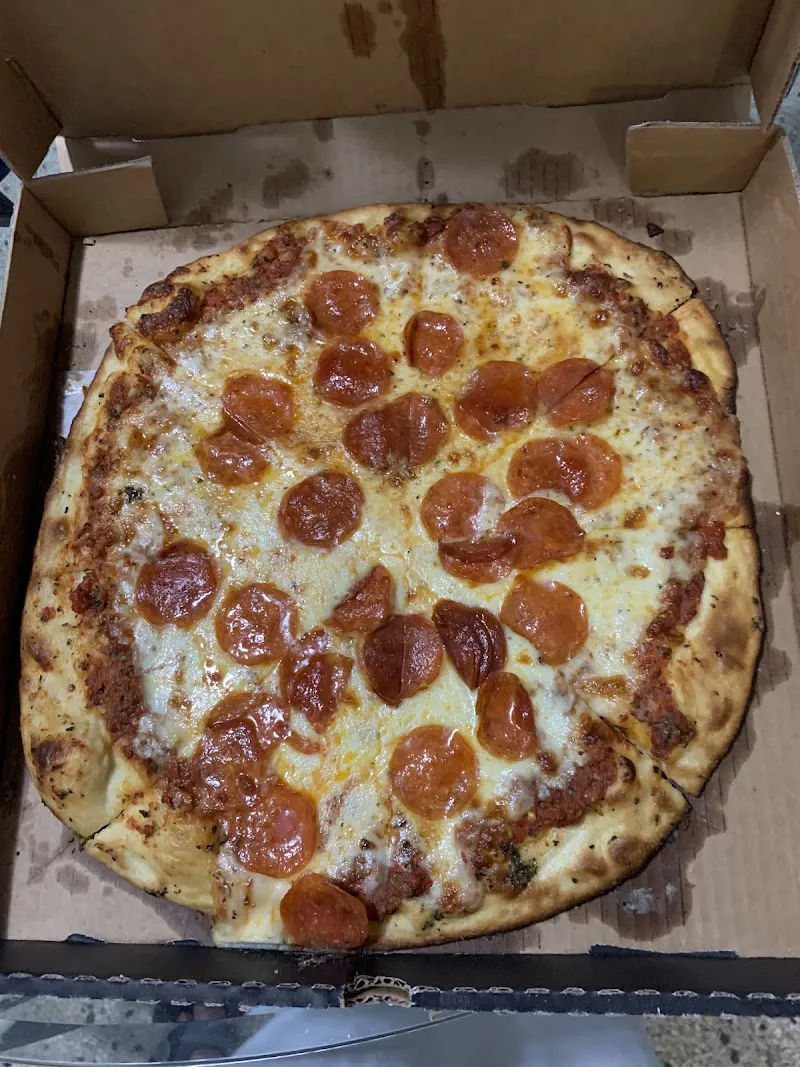 El Higüero Pizza & Rest